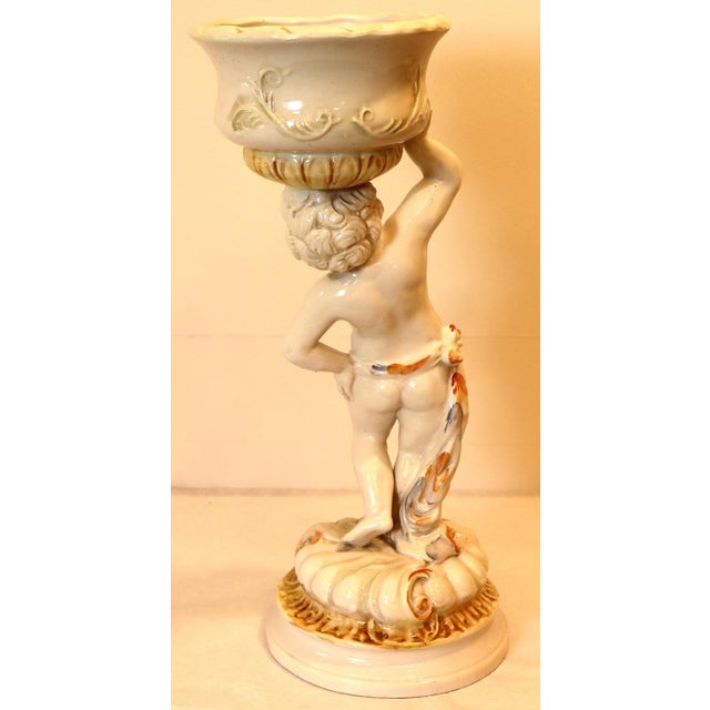 A beautiful ceramic cherub crafted by the renowned Ceramiche di Bassano. The elegantly decorated cherub's graceful...