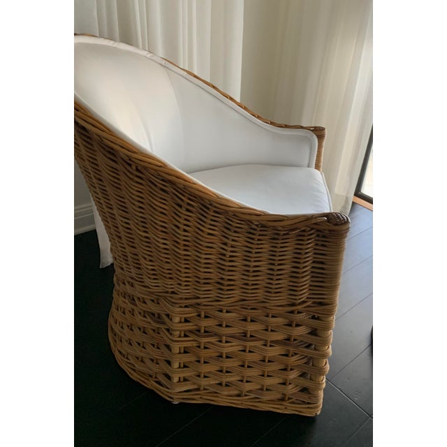 Beautiful wicker works chair with new white canvas upholstery