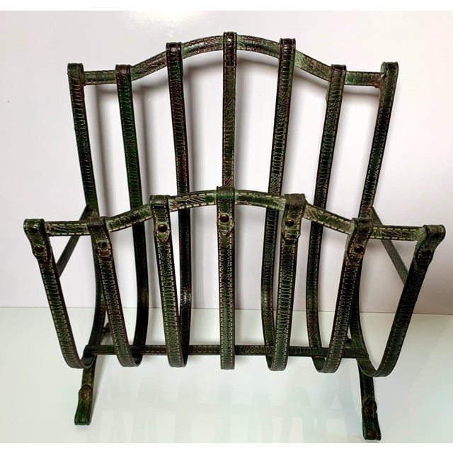 Vintage Equestrian Themed Iron Magazine Rack with a Strap Motif. Color is a deep rich dark gray-is brown bronze patina...
