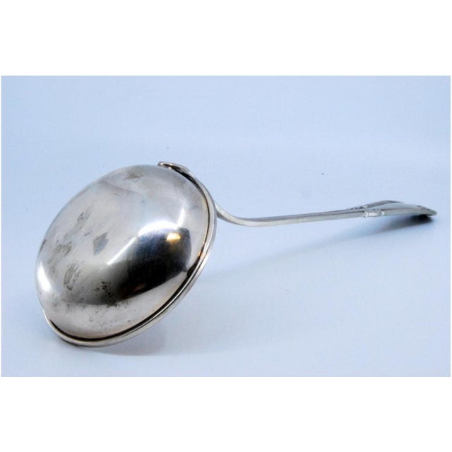 Silver Soup Ladle with Grooves Along the Handle with Reliefs Surrounding Monogram Card For Sale - Image 5 of 10