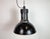 Industrial black pendant light made by elektrosvit in former czechoslovakia in 1951. White interior. Cast iron top. Two...