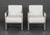 Pair of Ralph Lauren Home "Penthouse Collection" Club Chairs, each with white leather upholstery, chrome frame, and label...