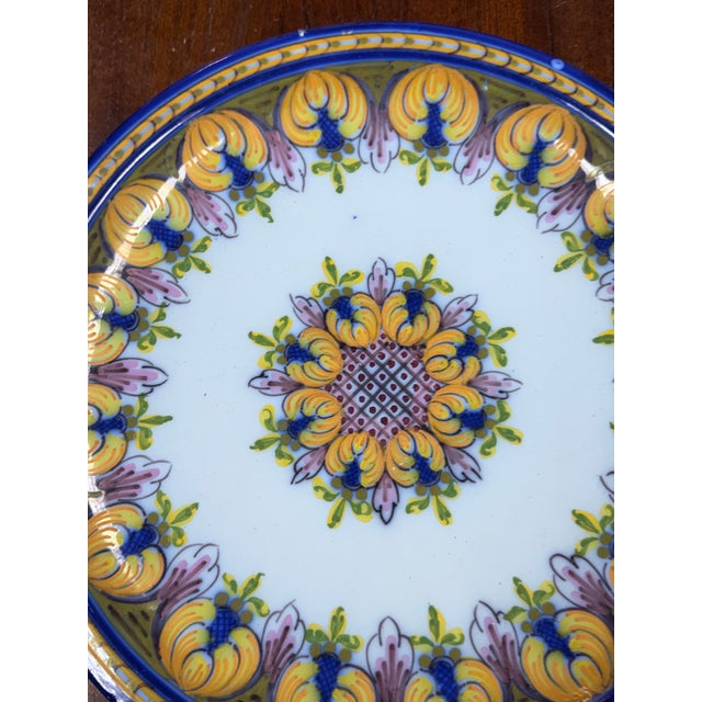 Design Plus Gallery presents a Ceramic Wall Plate made in Portugal. This decorative plate showcases a classic floral and...