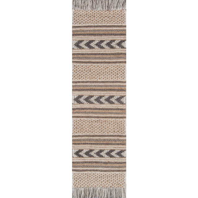 Humble materials meet high-fashion aesthetic in the luxe fabrication of this modern area rug collection. The inspired...