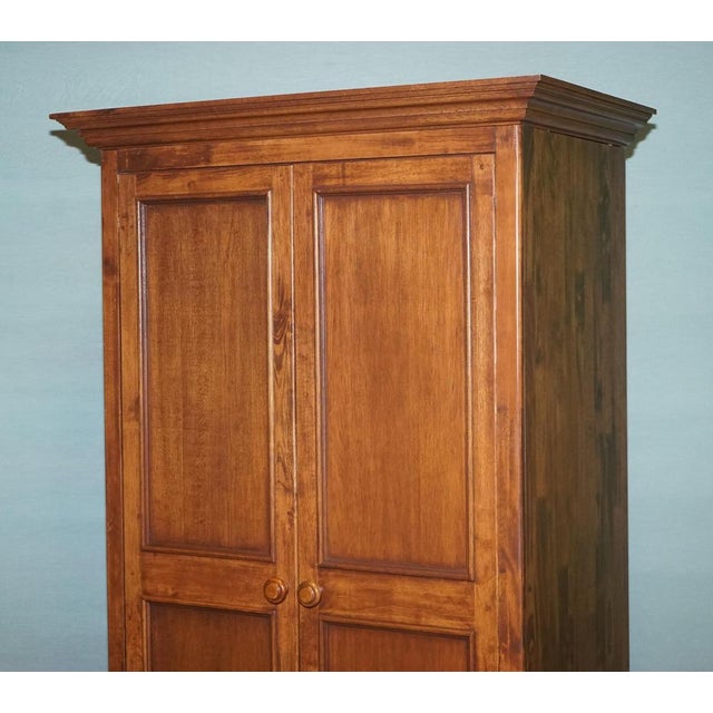 Antiques of London An elegant Willis & Gambier linen press or wardrobe, beautifully crafted in England from solid oak and...