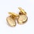 These are 18k yellow gold cufflinks adorned with seven diamonds each. Six 1.5mm stones surrounding a central 2.25mm...
