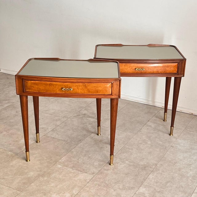 An elegant pair of mid-century Italian nightstands dating back to the 1950s and attributed to renowned designer Paolo...