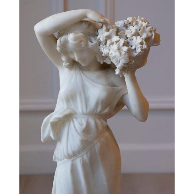 A graceful alabaster sculpture from Volterra, Tuscany, dating from the late 19th to early 20th century, depicting a young...