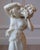 A graceful alabaster sculpture from Volterra, Tuscany, dating from the late 19th to early 20th century, depicting a young...