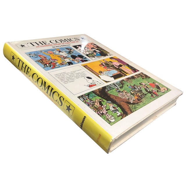 The Comics: An Illustrated History of Comic Strip Art by Jerry Robinson delves into the evolution of comic strips,...