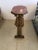 Unusually pretty rare shaped French Louis XVI style side table having octagonal marble top in a marvelous orangey rouge...