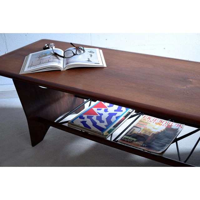 - Two-tier rosewood mid-century coffee table - A stylish and sophisticated coffee table - Fits nicely into just about any...