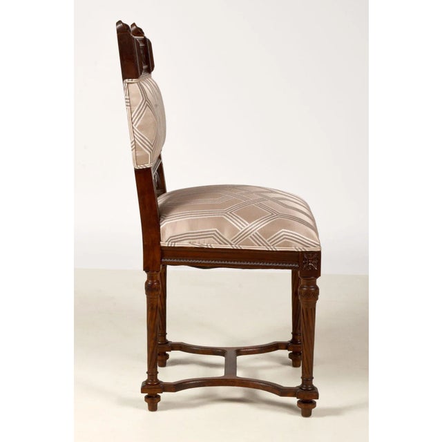 Antiques Louis XVI style dining chairs, set of 6. Constructed from European walnut every one is hand carved by the master...