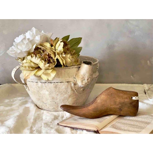 An antique Italian basin dating back to the early 20th century, crafted from a heavy copper alloy and featuring two sturdy...