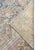 An antique hand-knotted rug with a beautifully drawn geometric medallion combining tribal-inspired motifs and stylized...