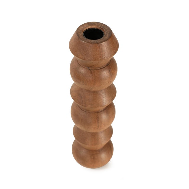 Handcrafted from richly grained wood, this sculptural candle holder features a playful stacked silhouette with alternating...