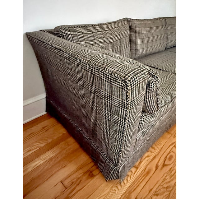 A dapper gentleman, this midcentury tweed houndstooth plaid sofa has tailored lines and timeless appeal. Upholstered in...