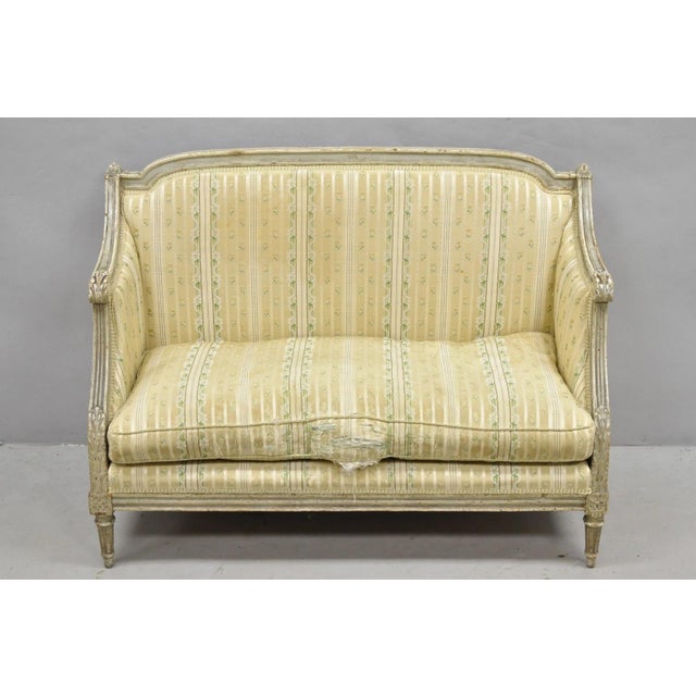 Antique French Louis XVI Maison Jansen Style Cream Distress Painted Petite Canape Small Settee Sofa. Item features a...