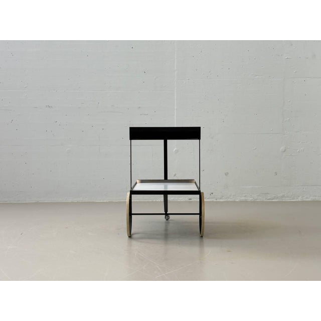 An iconic serving trolley by dutch designer cees braakman for pastoe from the 1950s. The design combines functional...