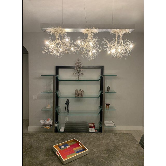 The art of connection sculptural linear pendant light — three handcrafted roots “when the roots are deep, there is no...