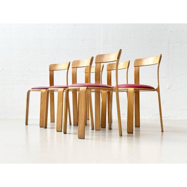 These beautifully designed chairs from the swiss manufacturer dietiker are crafted from bent plywood with clean,...