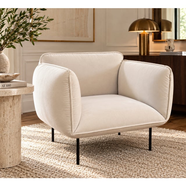 A sculptural Nakki 1\-Seater lounge chair designed by Finnish designer Mika Tolvanen for Danish furniture manufacturer...