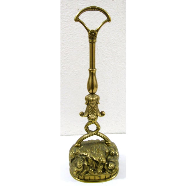 The Antique Victorian-Era Solid Brass Doorstop Door Porter is a beautifully crafted decorative accessory perfect for...