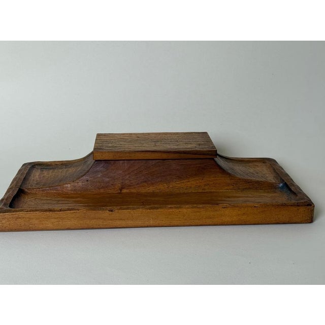 This lovely hand-carved writing tray is from the 1930s, and it was crafted by hand in the traditional Waldorf style. It's...
