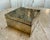 Elegant vintage Italian rectangular box crafted in richly textured hammered brass. Its warm golden finish and organic...