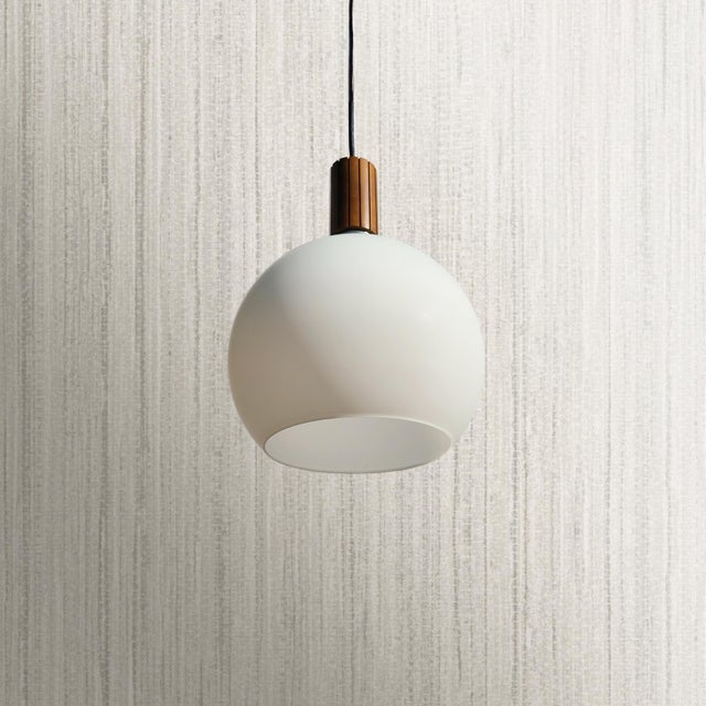 This mid century modern pair of thick frosted glass globes have a large opening to direct the light. Their monumental...