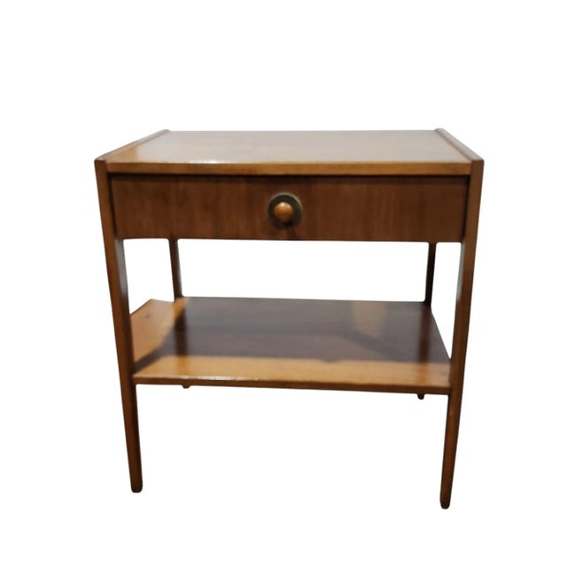 Rare and beautiful pair of walnut nightstands, designed by John Van Koert for Drexel Furniture, both in excellent...