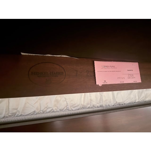 This Henkel Harris King size bed bench was made in 2007 in mahogany finish and Ivory Damask upholstery. Lightly used with...