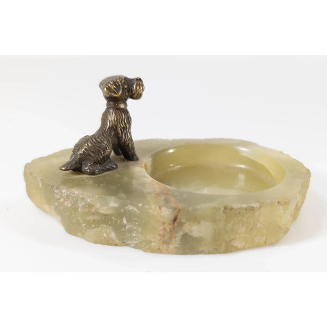 We are selling this charming little onyx ashtray with mounted brass or bronze Scotty dog figure, probably Art Deco period....