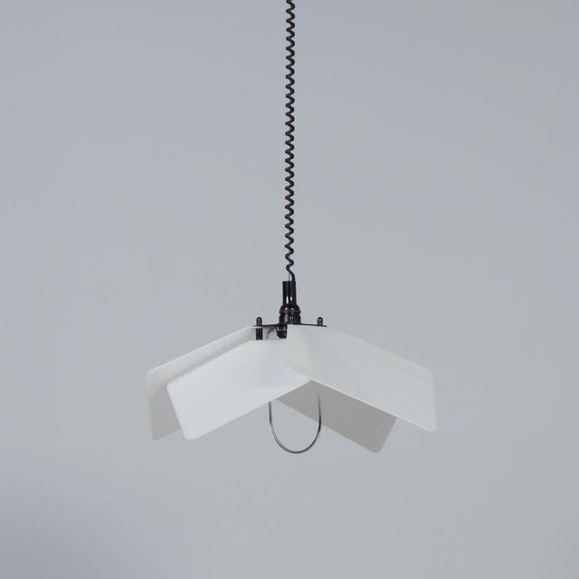 Lamperti farfalle pendant lamp model 9475 from the 1980s with an adjustable drop and distinctive white shade elements. The...