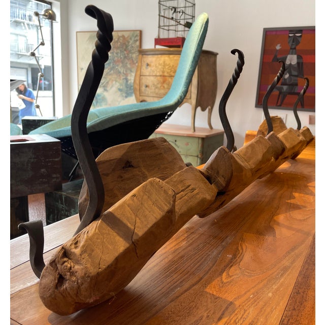 This is a fantastic Mexican wooden yoke fashioned into a coat rack.