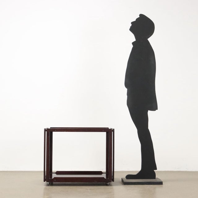 Trolley, veneered wood and solid exotic wood. This piece is attributed to the mentioned designer/maker. It has no...