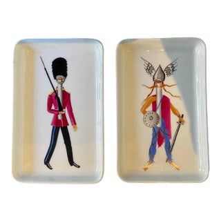 Guy Thirion Limoges Trays of a Viking and British Royal Guardsman - A Pair For Sale