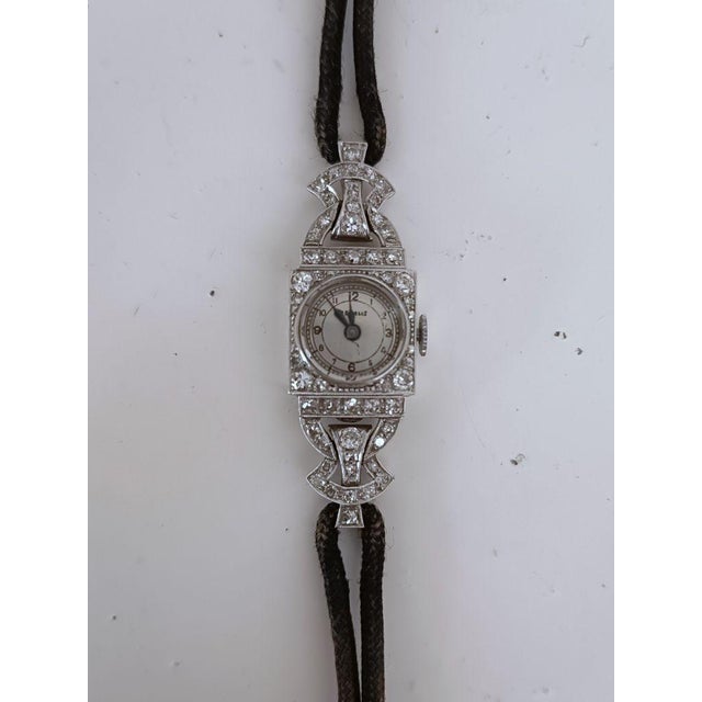 Brand Regalis Model Liberty Year 1920-29 Movement Manual winding Materials Platinum Case Platinum and rosettes set Dial...