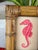 Hand-painted by master artists using acrylic paints and natural pigments, this whimsical pink seahorse is full of...