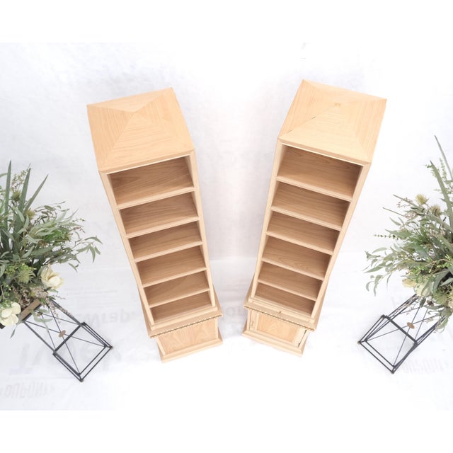 Pair New Unfinished Baker Obelisk Shape Double Sided 360 Degree Walnut Bookcases. These Baker cabinets are new unfinished...