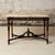Add rich French elegance to your space with this 19th century French dark wood base and marble top table, a beautifully...