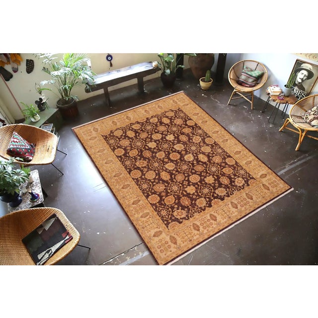 "Enhance the ambiance of your home with this magnificent Persian-influenced Turkish hand-knotted rug made by skilled...