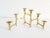 Scuptural Mid Century Modern Danish solid brass center piece candelabra. The piece features 6 candle holders and a clever...
