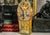 A striking vintage Egyptian painted wood sarcophagus, beautifully hand painted in vivid tones of red, gold, black, and...