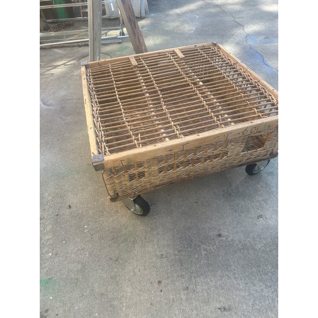 Up for consideration is a beautiful vintage wicker square rolling coffee table. This would look lovely in your home and it...