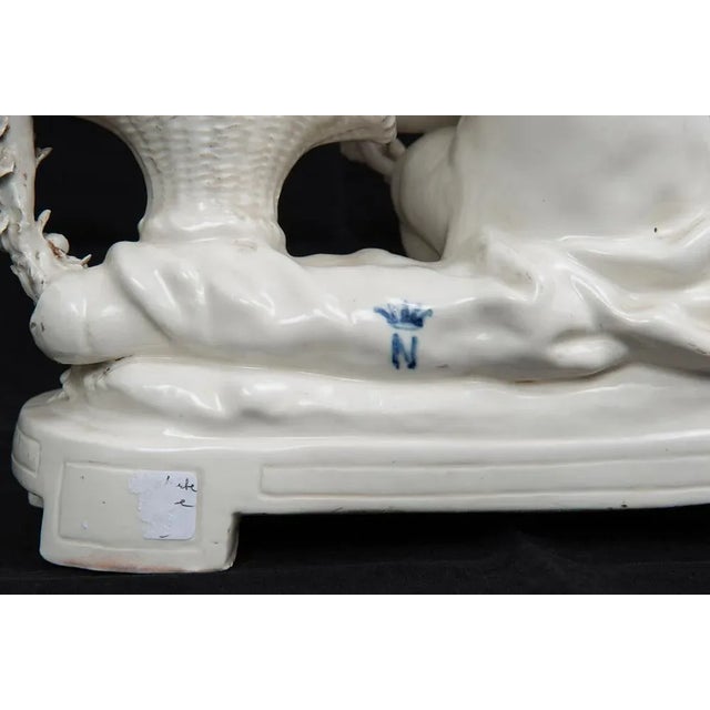Porcelain Sculpture Depicting Putto with Basket of Flowers from Capodimonte, 20th Century For Sale - Image 5 of 7