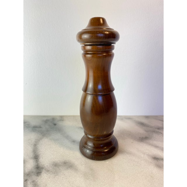 Classic Italian salt shaker and pepper grinder combination by Tre Spade, crafted in richly toned dark wood with a...