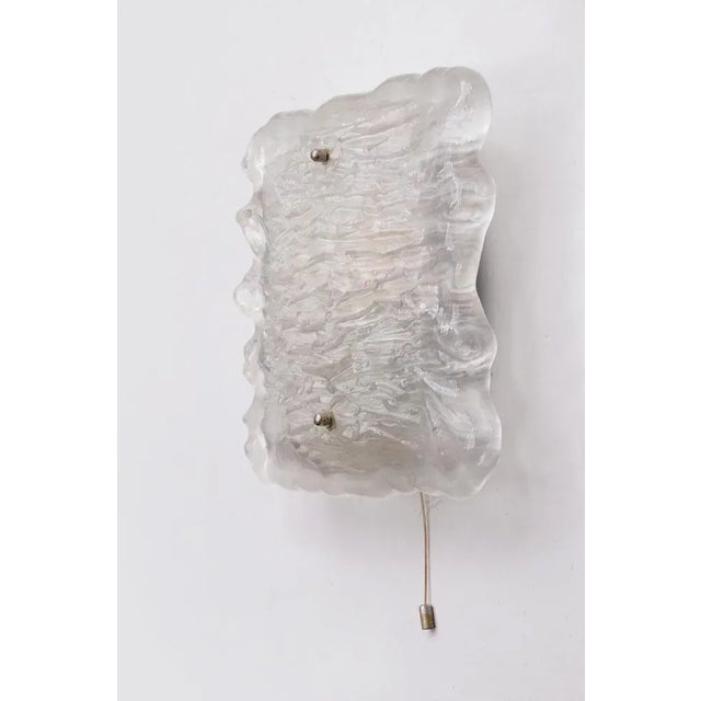 Beautiful large wall lamp with an original choir. There are two thin fittings e14 on a metal plate. The glass plate is...