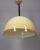 Pendant lamp with large yellow plastic lampshade, Baobab model, designed by Guzzini This piece has an attribution mark, I...