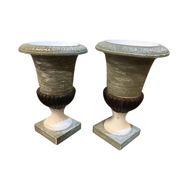 Matching pair of urns featuring a distressed vintage European garden look. Perfect for table top, mantels, or entryways....